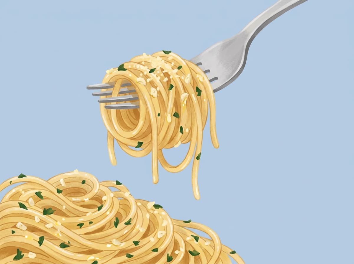 A bowl of garlic butter spaghetti with parsley